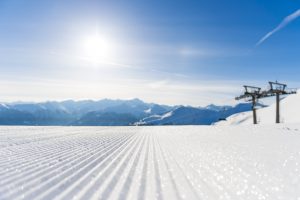 Top präparierte Piste im Gasteinertal mit strahlendem Sonnenschein