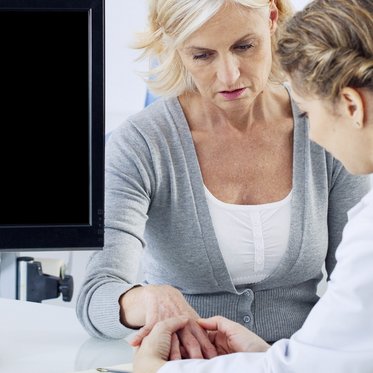 Befundbesprechung zwischen Patient und Arzt